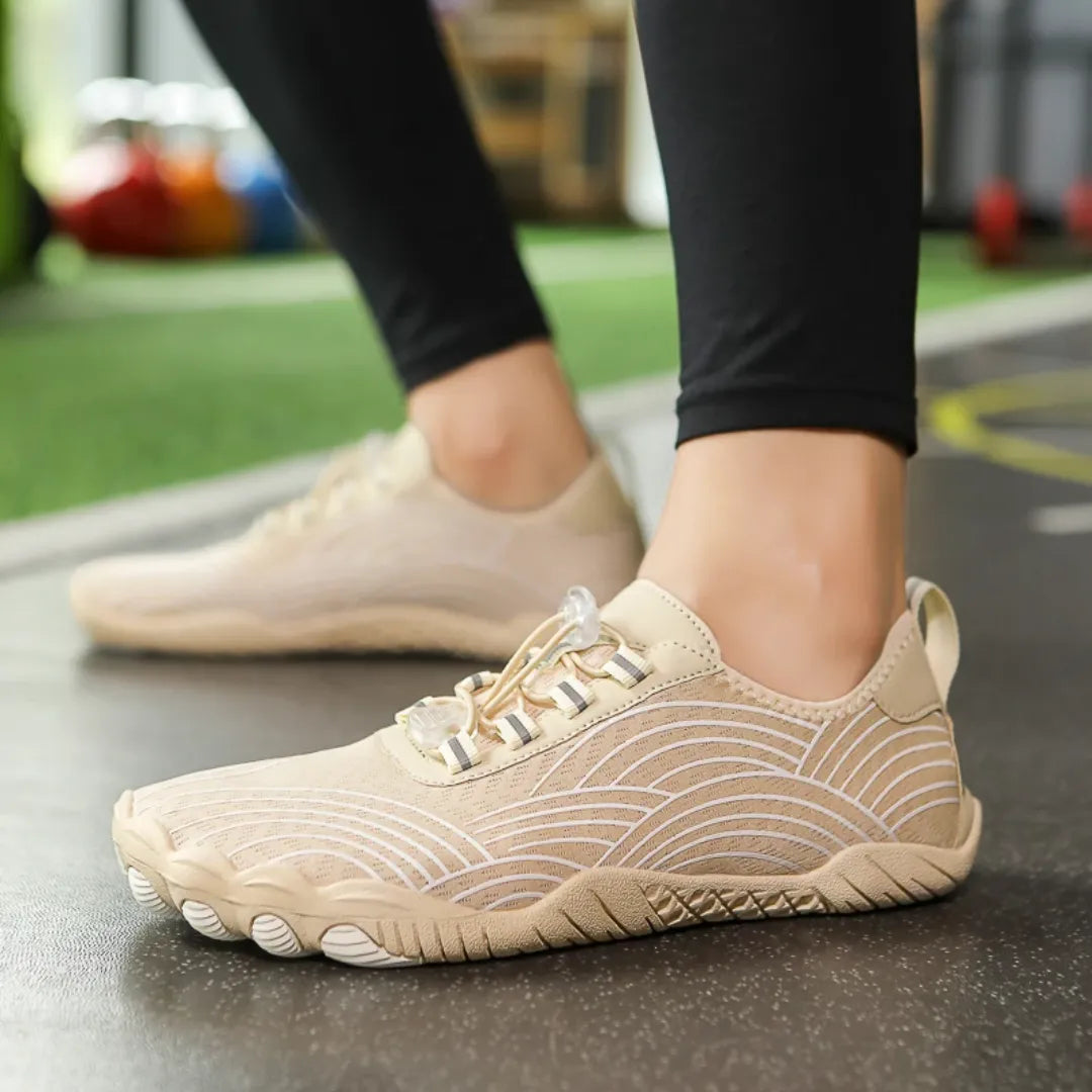 AquaFreedom Water Grip barefoot water shoes in action - gym lifestyle-beige