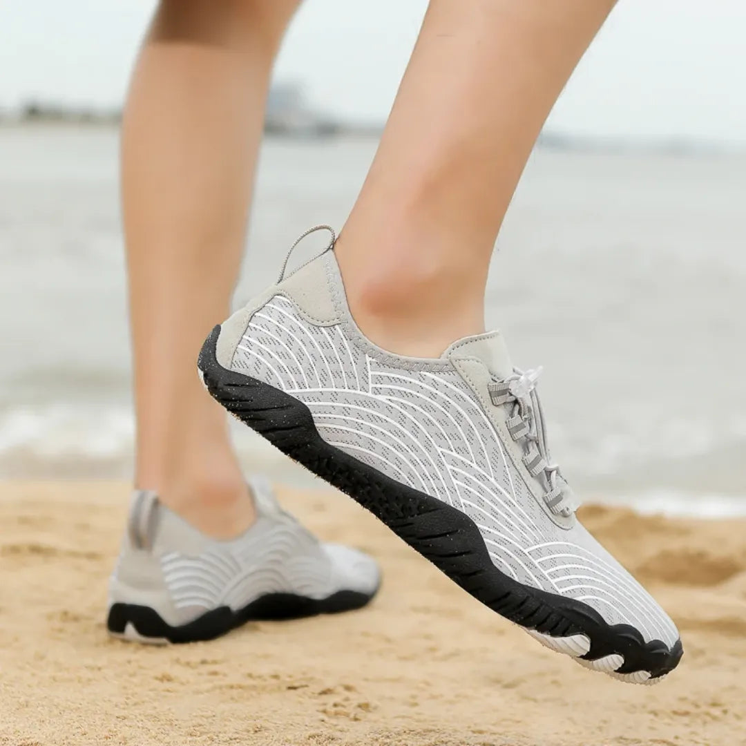 AquaFreedom Water Grip barefoot water shoes in action - beach lifestyle and water sports