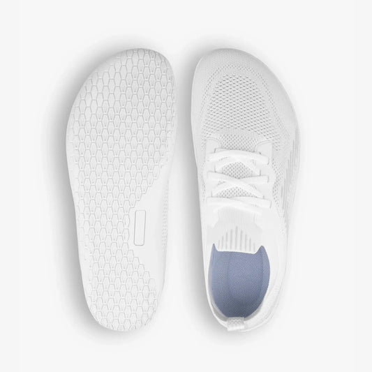 White barefoot training shoes with wide toe box and hexagonal sole pattern